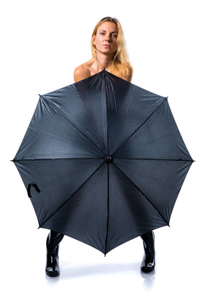 Beautiful blonde girl holding an umbrella