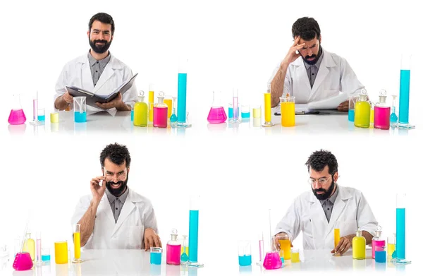 Scientist man with test tubes — Stock Photo, Image