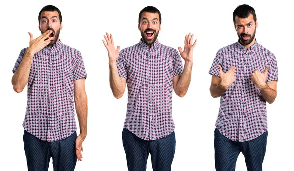 Handsome brunette man over isolated background — Stock Photo, Image