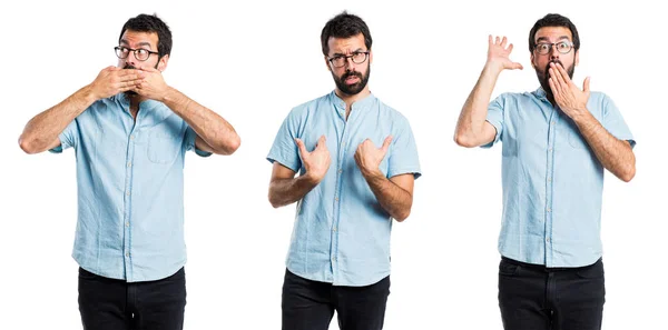 Handsome man doing surprise gesture — Stock Photo, Image