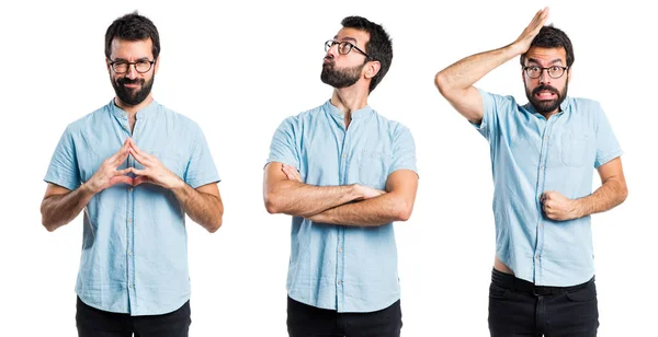 Bonito homem com óculos a pensar — Fotografia de Stock