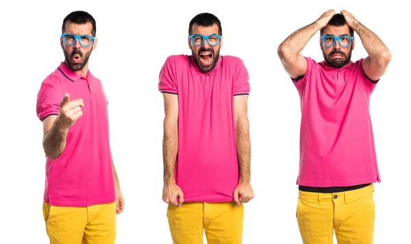 Hombre frustrado con ropa colorida —  Fotos de Stock