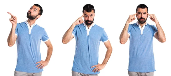Man met blauwe shirt denken — Stockfoto