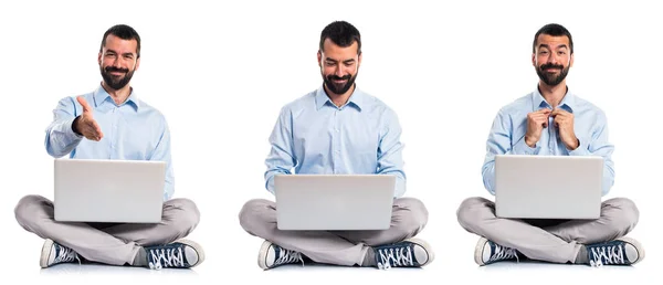 Handsome man with laptop — Stock Photo, Image