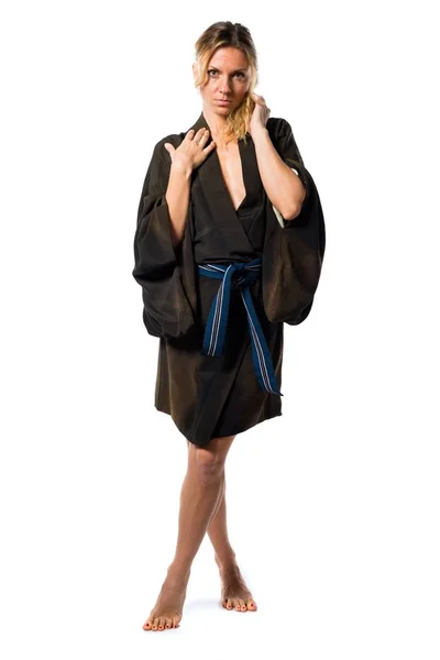 Loira mulher vestida com vestido asiático — Fotografia de Stock