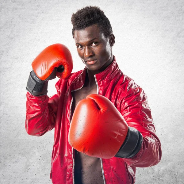 Black man with boxing gloves