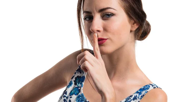 Pretty young girl making silence gesture — Stock Photo, Image