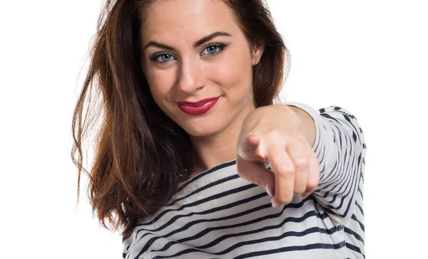 Chica joven y bonita señalando hacia el frente —  Fotos de Stock