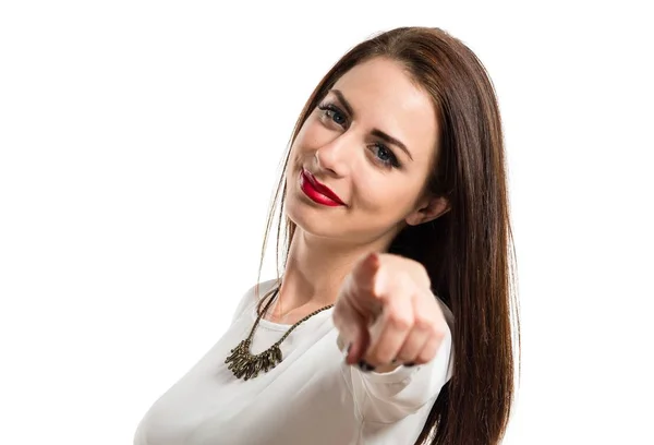 Pretty young girl pointing to the front — Stock Photo, Image