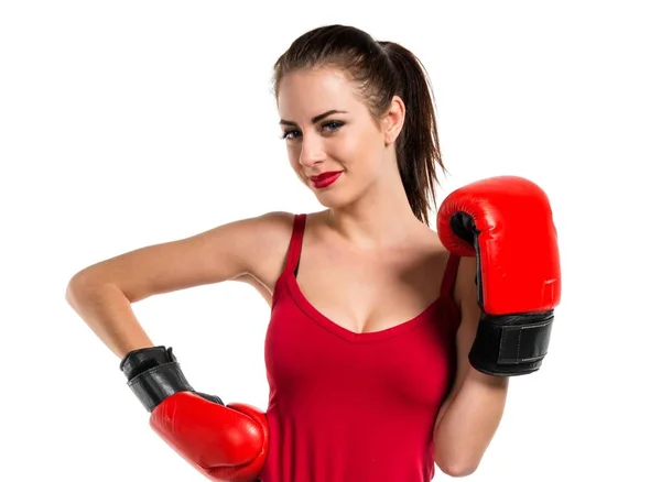 Mujer bastante deportiva con guantes de boxeo —  Fotos de Stock