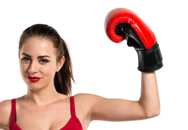 Jolie femme sportive avec des gants de boxe — Photo