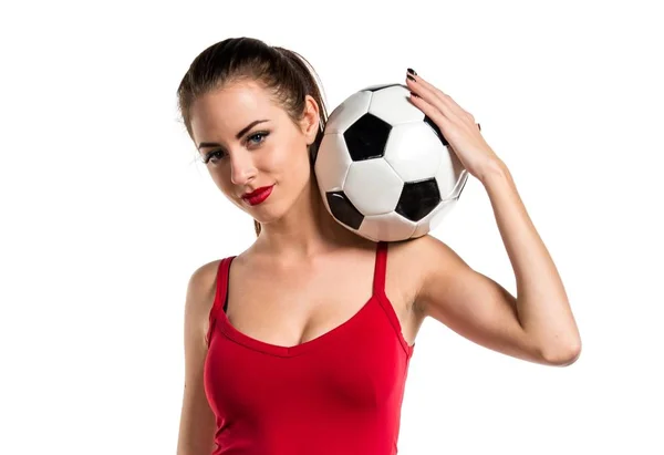 Bella donna sportiva in possesso di un pallone da calcio — Foto Stock