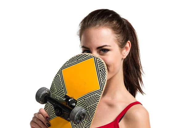 Pretty sport woman with skate — Stock Photo, Image