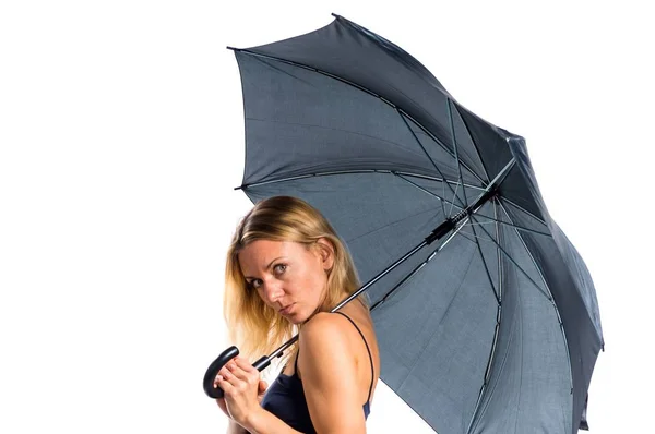 Beautiful blonde girl holding an umbrella — Stock Photo, Image