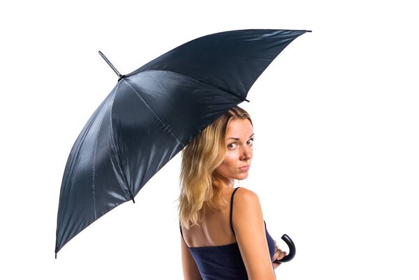 Beautiful blonde girl holding an umbrella
