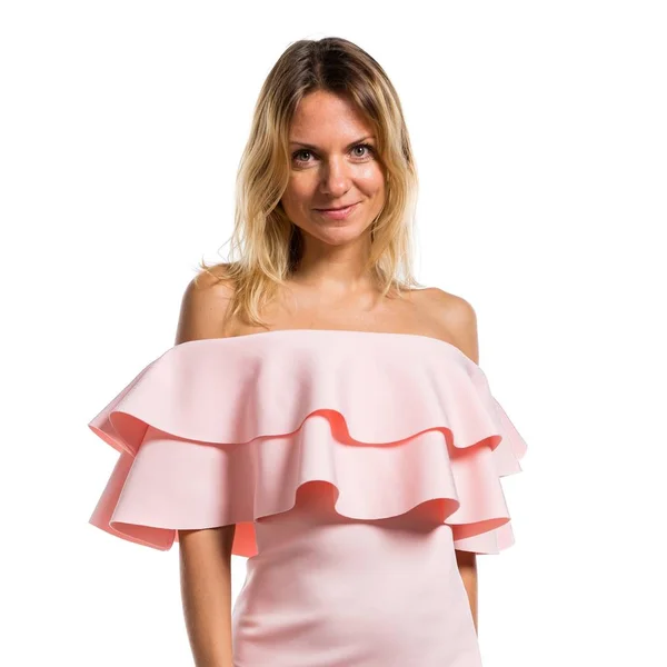 Hübsche Model-Frau posiert im Studio mit rosa Kleid — Stockfoto