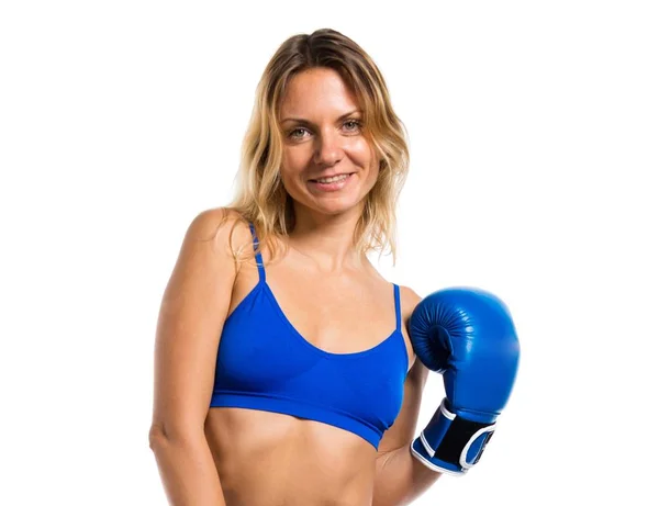 Pretty blonde woman with blue boxing gloves