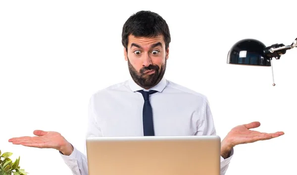 Businessman in his office making unimportant gesture — Stock Photo, Image