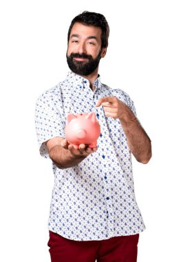 Bir servet tutan sakallı yakışıklı esmer adam