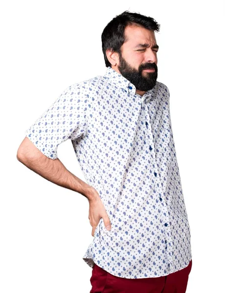 Hombre guapo morena con barba con dolor de espalda —  Fotos de Stock