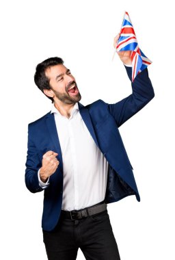 Yakışıklı adam İngiltere'de bayrak tutan