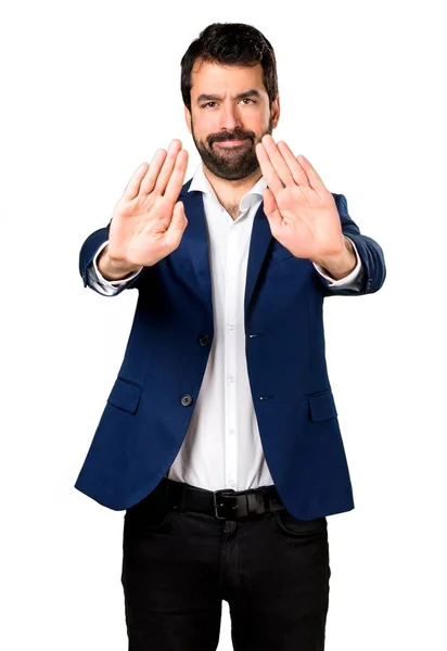 Schöner Mann macht Stoppschild — Stockfoto