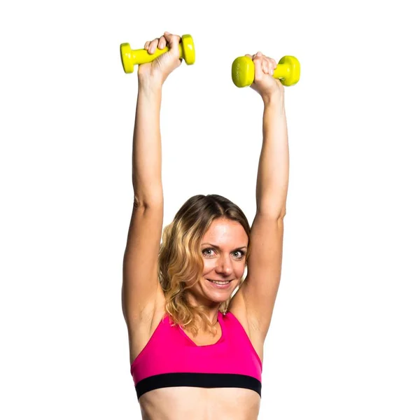 Deporte mujer haciendo levantamiento de pesas — Foto de Stock