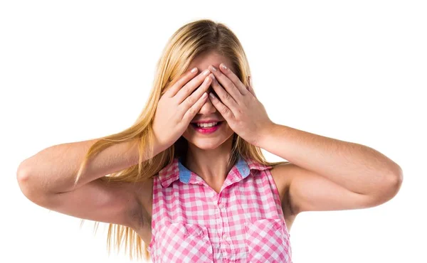 Blonde girl covering her eyes — Stock Photo, Image