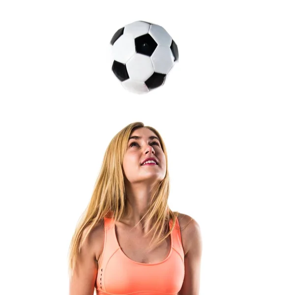 Menina loira bonita segurando uma bola de futebol — Fotografia de Stock