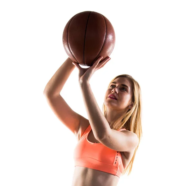 Blonde girl playing basketball — Stock Photo, Image