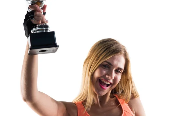 Sport woman holding a trophy — Stock Photo, Image