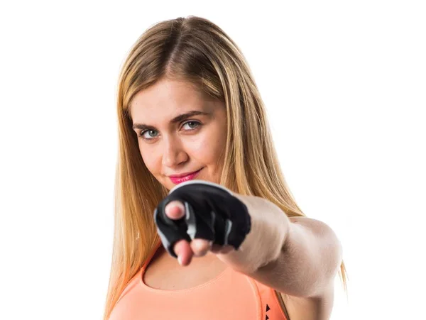 Sport-kvinna som pekar på framsidan — Stockfoto