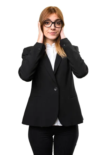 Young business woman covering her ears — Stock Photo, Image