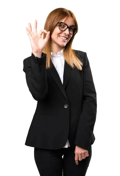 Young business woman making OK sign — Stock Photo, Image