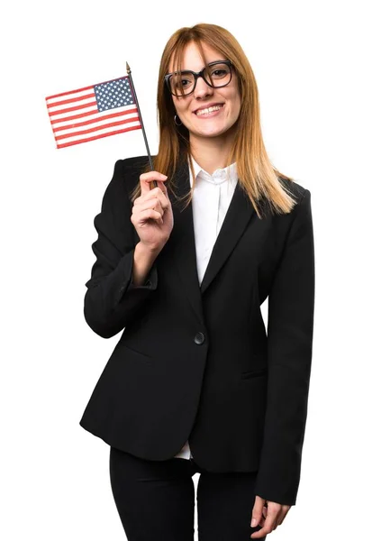 アメリカの国旗を保持している若いビジネス女性 — ストック写真