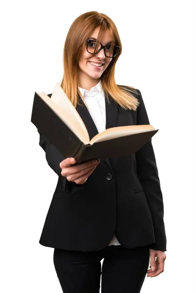 Young business woman reading book — Stock Photo, Image