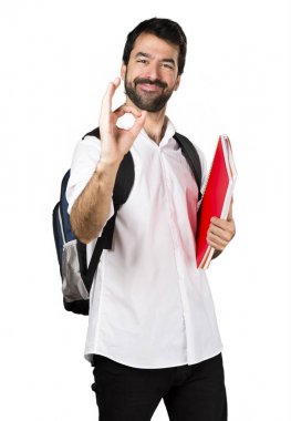 Ok işareti yaparak öğrenci adam