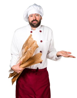 Biraz ekmek tutarak ve önemsiz jest yapma genç baker