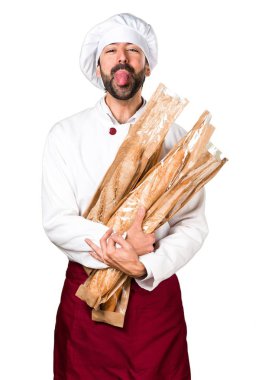 Biraz ekmek tutarak ve onun dilini alarak genç baker