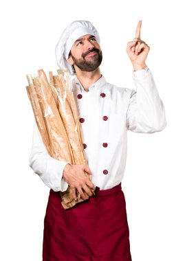 Biraz ekmek basılı tutup yukarı dönük genç baker