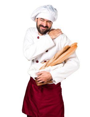 Genç baker ekmek omuz ağrısı ile tutarak
