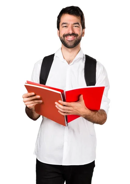 Student człowiek z notebookami — Zdjęcie stockowe