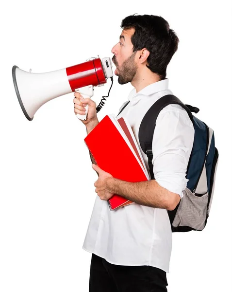 Student man schreeuwen door megafoon — Stockfoto