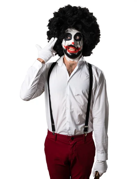 Killer clown with knife making suicide gesture — Stock Photo, Image