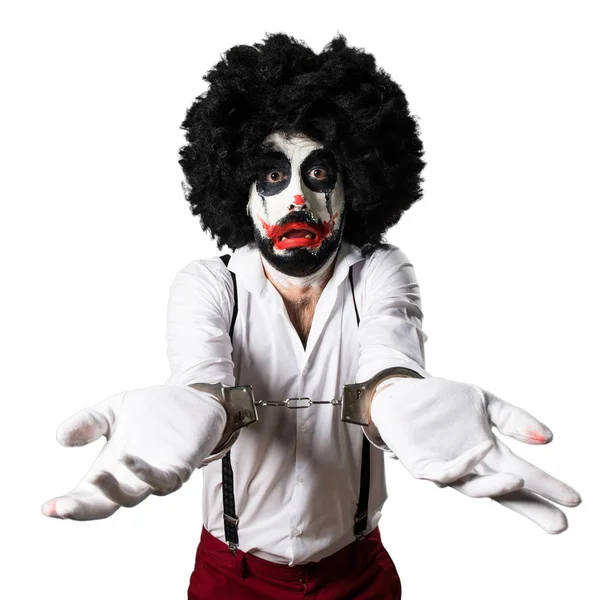 Killer-Clown mit Handschellen — Stockfoto