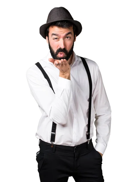 Hipster man with beard sending a kiss — Stock Photo, Image