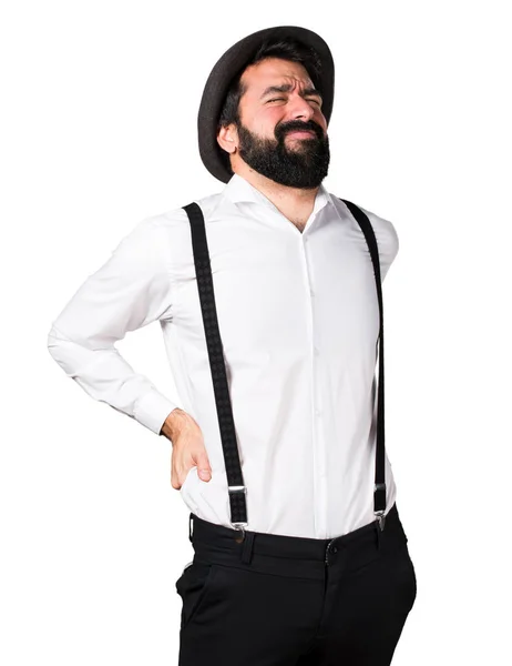 Hipster man with beard with back pain — Stock Photo, Image