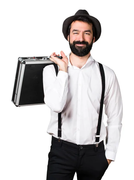Hipster man with beard holding a briefcase — Stock Photo, Image