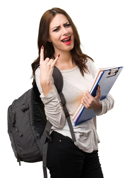 Student woman making horn gesture — Stock Photo, Image