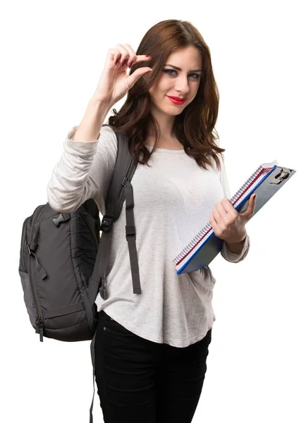 Estudante mulher fazendo sinal minúsculo — Fotografia de Stock